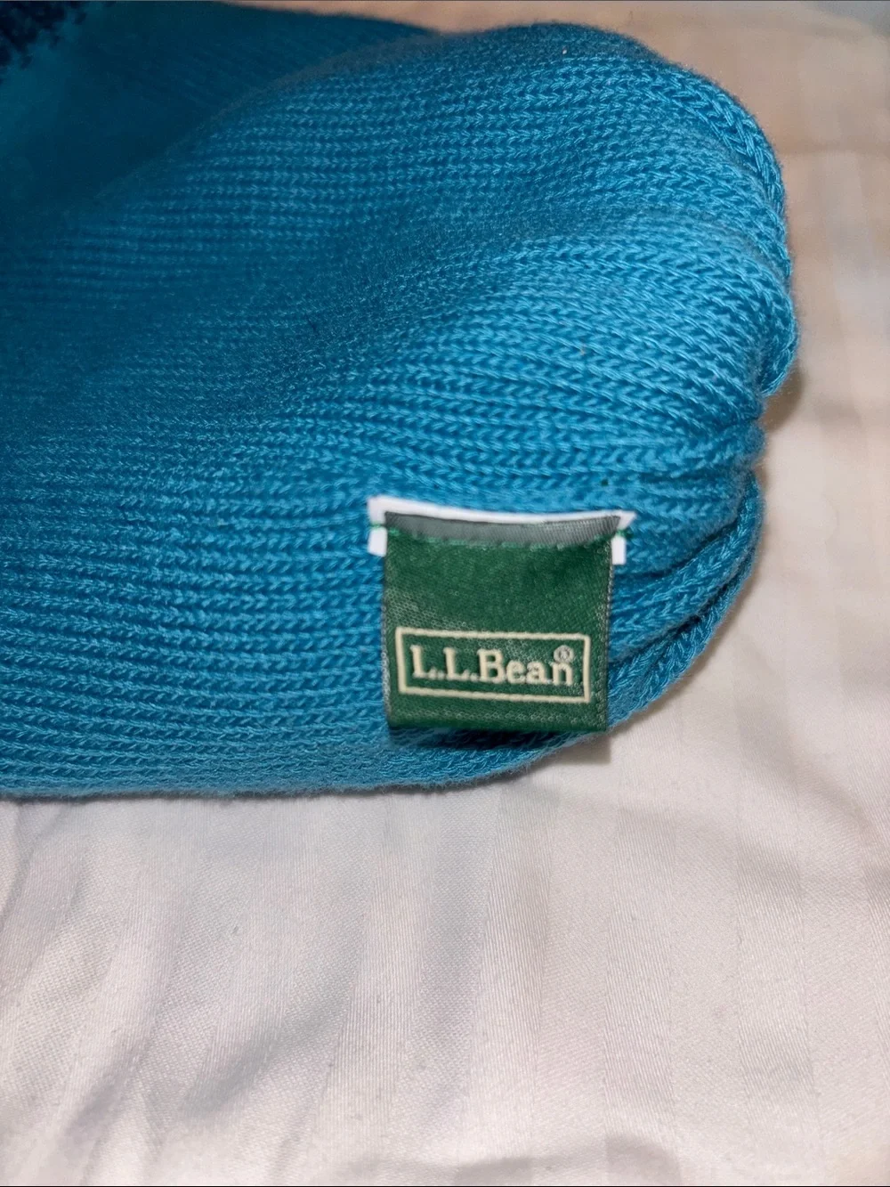 L.L. Bean Women’s Cable Knit Beanie in Teal and Navy
